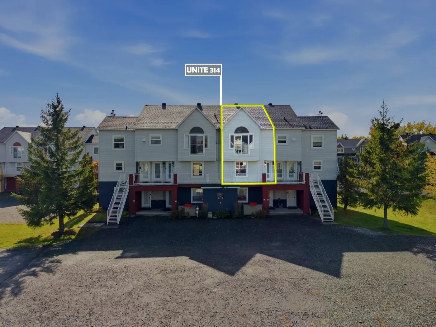 A block of townhouses with one unit outlined and labelled